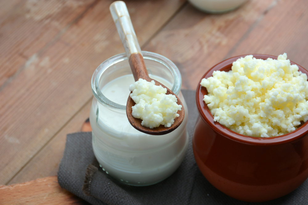 Cottage cheese and milk - two of the probiotics that ease bloating.