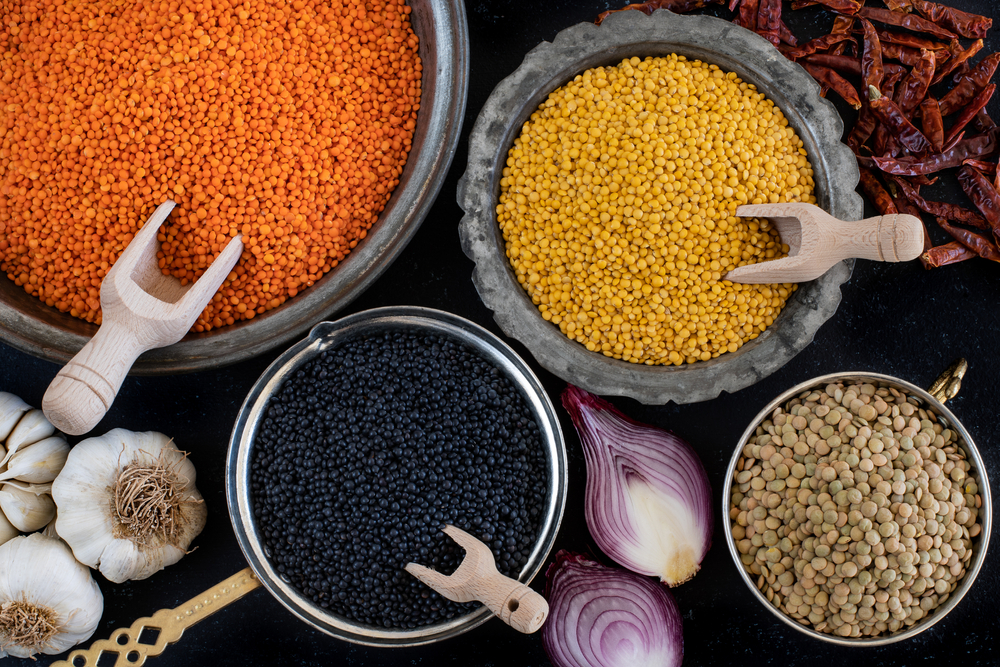 A few kinds of lentils in jars.