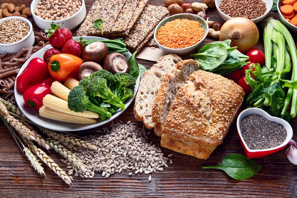 Fresh vegetables and grains are part of a balanced diet.