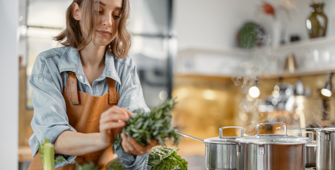 women cooking healthy meal in the kitchen