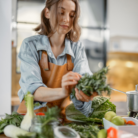 women cooking healthy meal in the kitchen